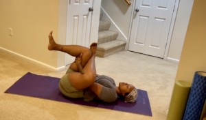woman on floor stretching